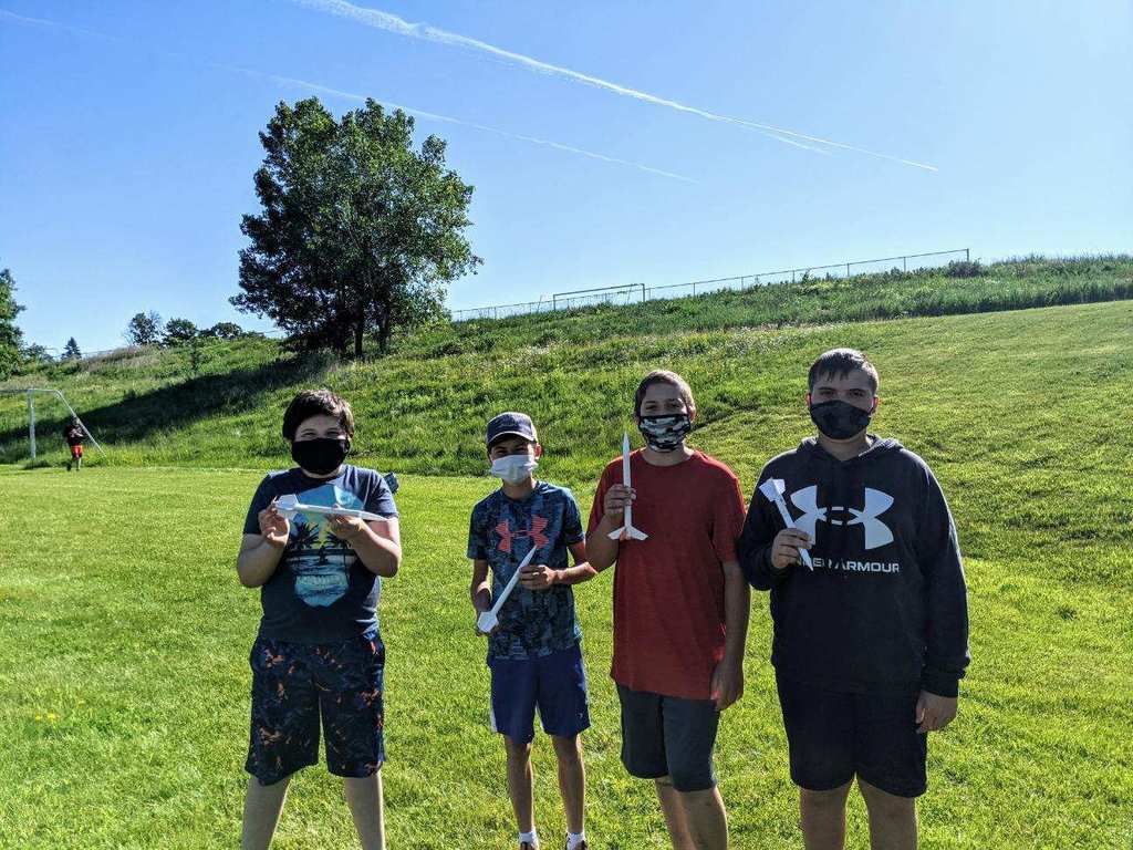 4 students with rockets