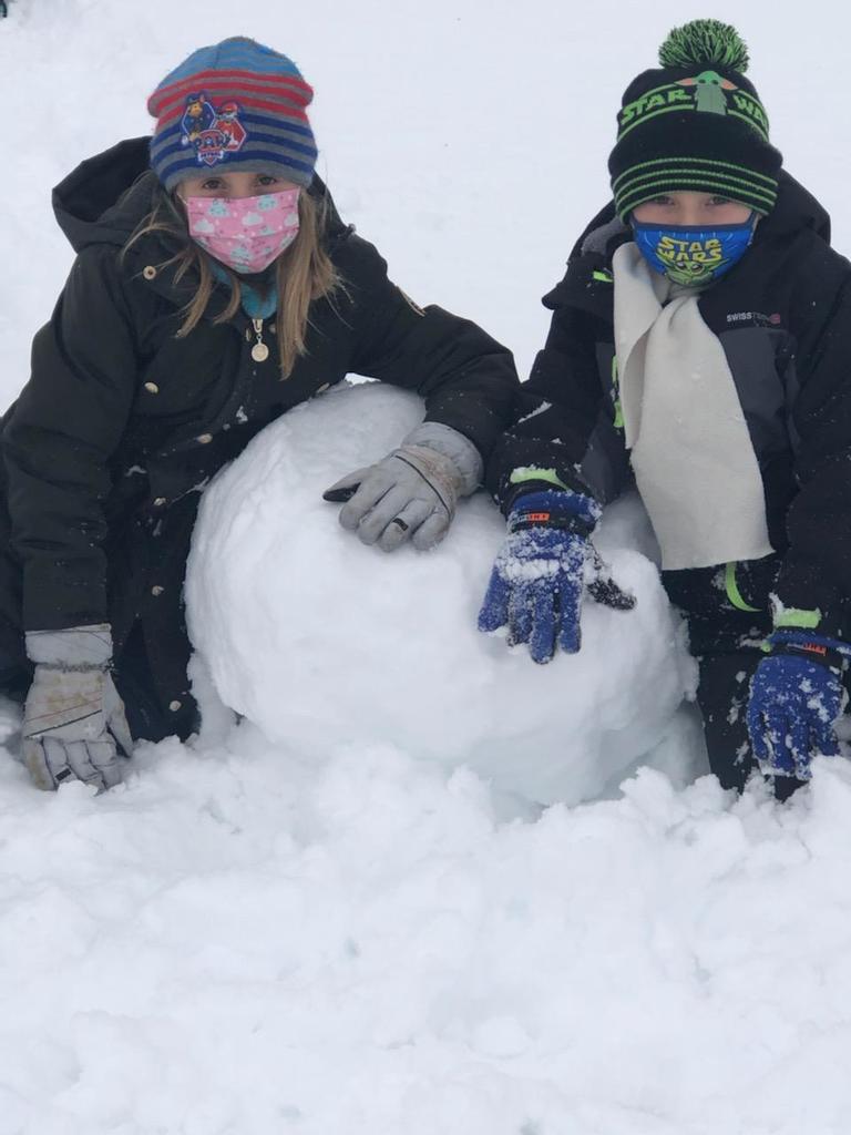 two students and snowball