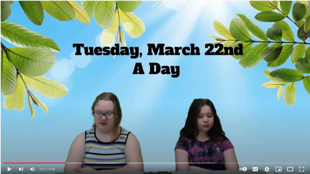 two students at news desk with blue sunny sky and leaves on green screen
