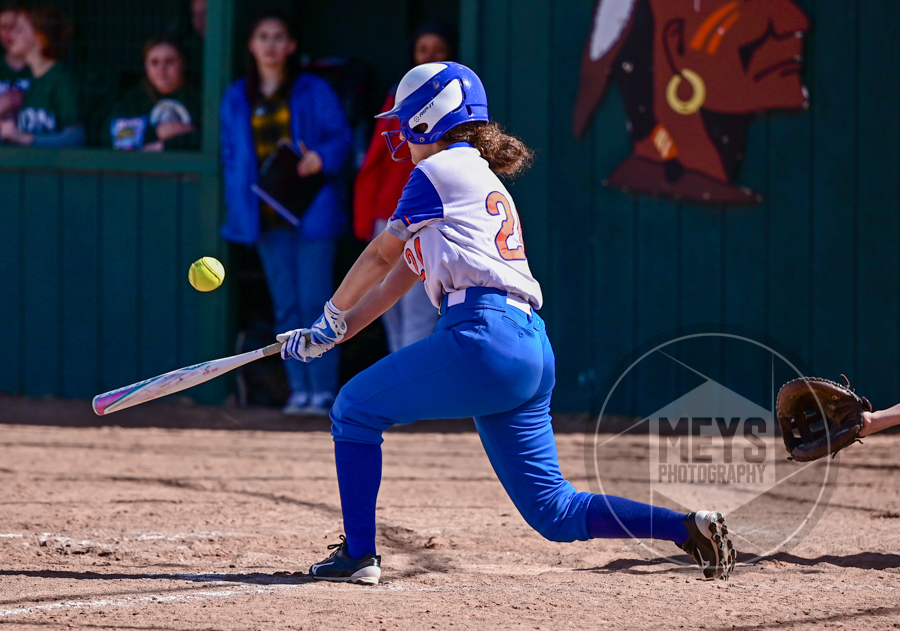 softball player hitting
