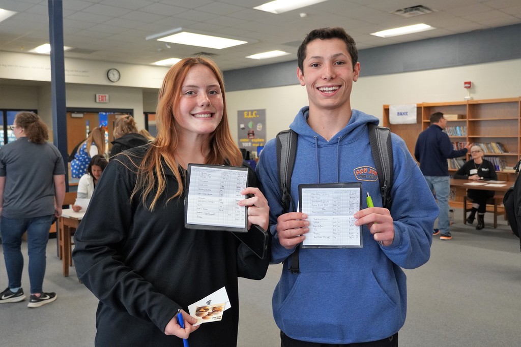 two students with check books