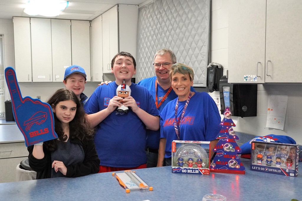 staff and students in Bills Gear