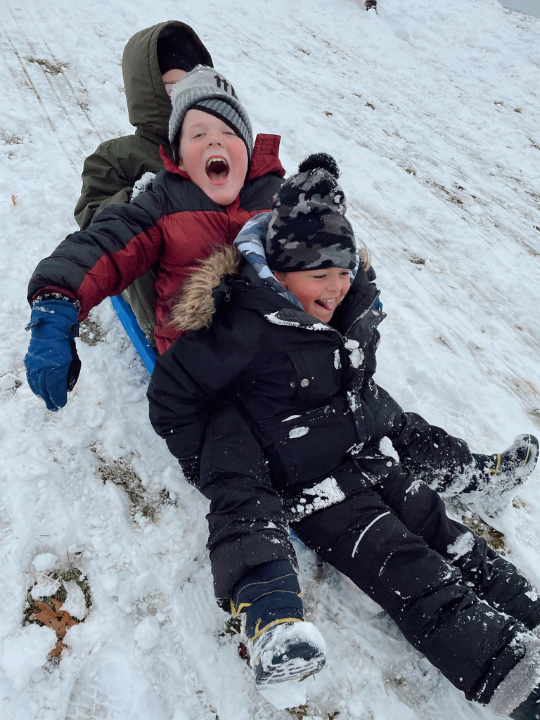 students sledding