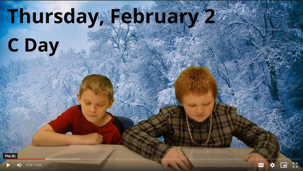 two students at news desk with snowy trees on green screen