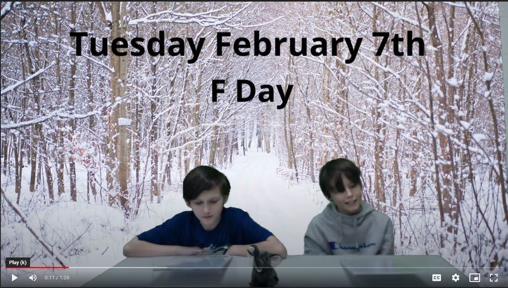 two students at news table with snowy tree lined path on green screen
