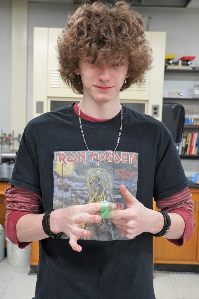 student pulling taffy