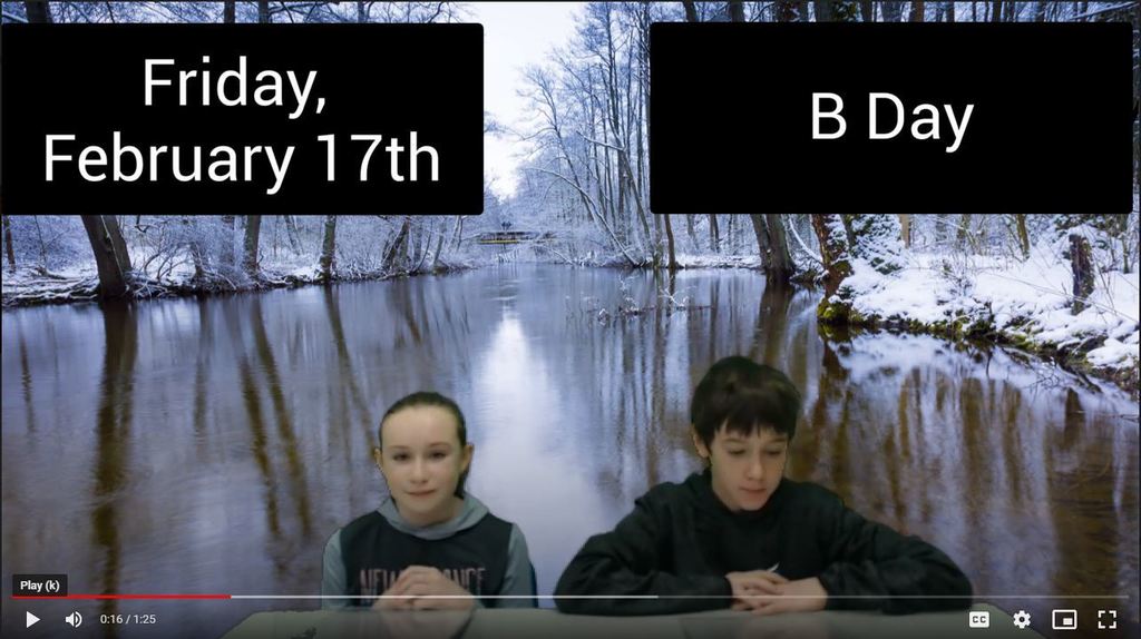 two students at news desk with snowy creek on green screen