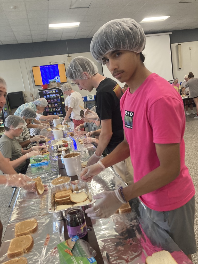 students making sandwiches