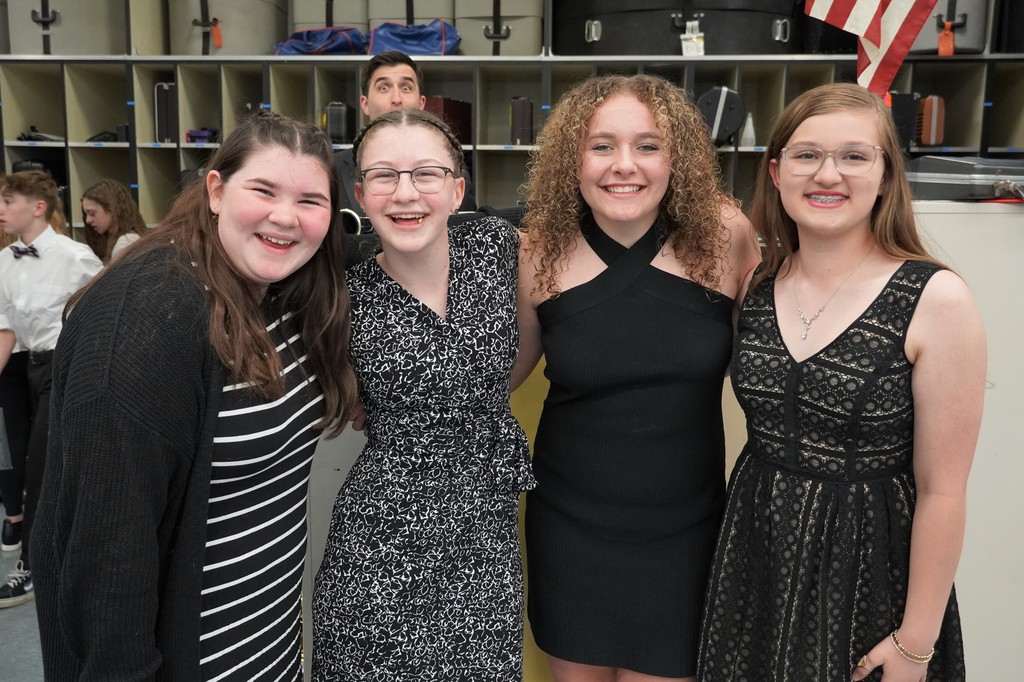 students dressed in black and white  for band concert