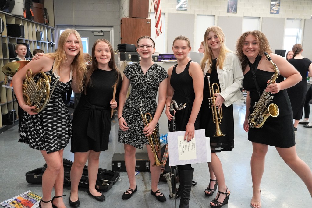students dressed in black and white  for band concert