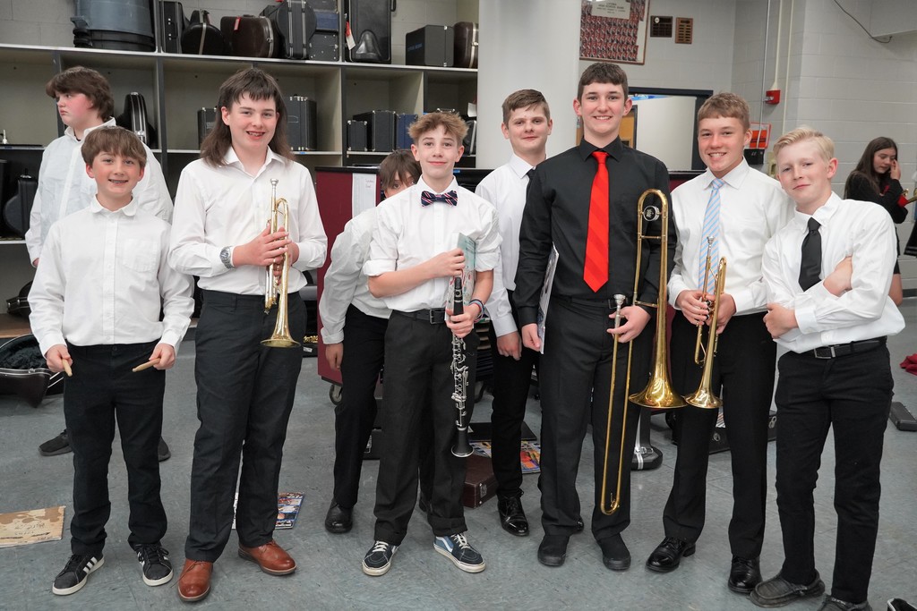 students dressed in black and white for band concert