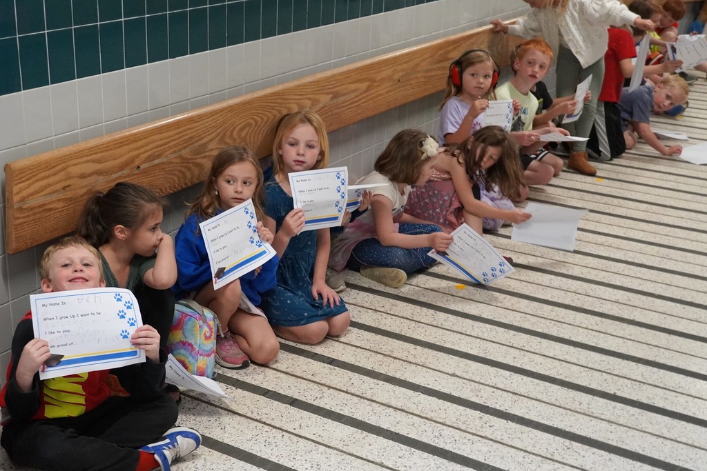 students with signs