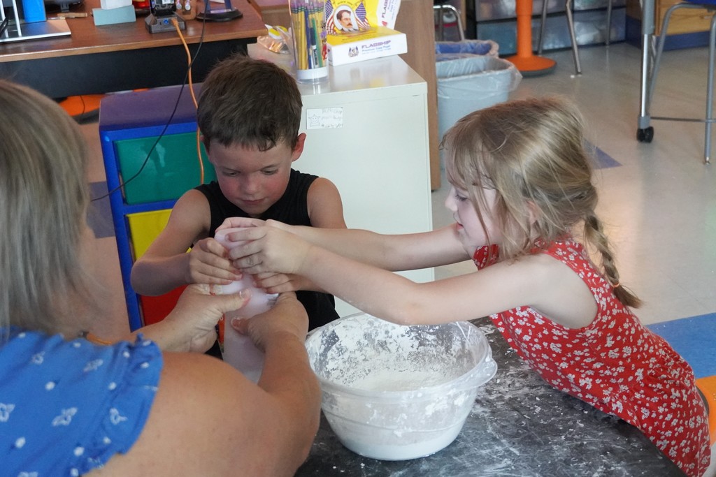 students making cloud dough